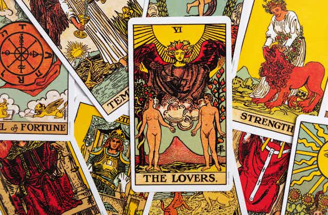 Tarot cards with 'the lovers' on top