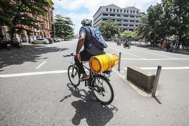 Man on bike in Colombo