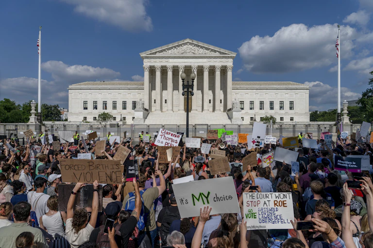 Protestors gather outside the US Supreme Court