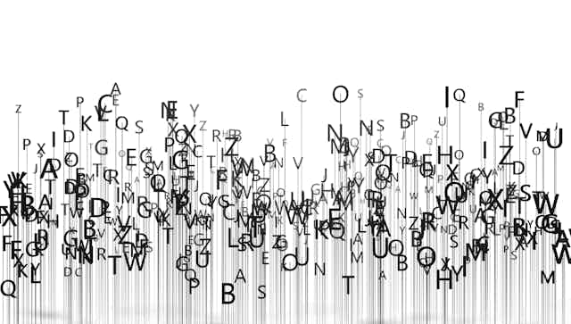 An illustration of letters from the English alphabet sliding down the page.