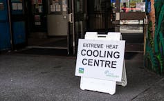 A sign that reads 'Extreme Heat Cooling Centre' placed outside a centre by the City of Vancouver