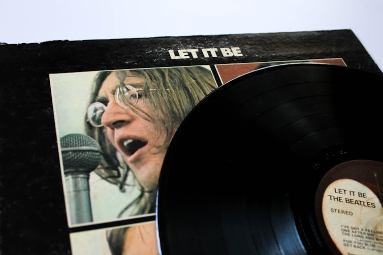 Detail of part of the cover of the Beatles album 'Let it Be' showing John Lennon.
