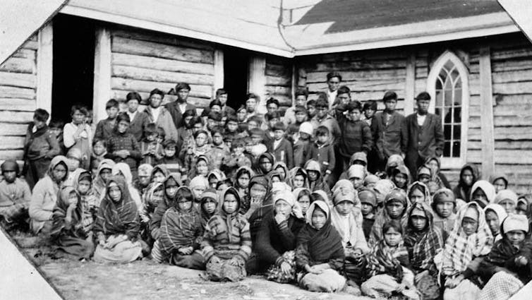 An archive photo of students outside of a day school