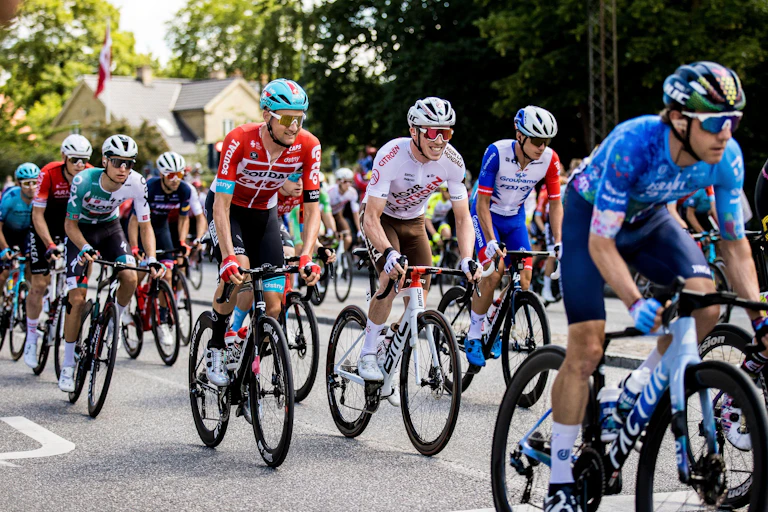 Cyclists grimacing