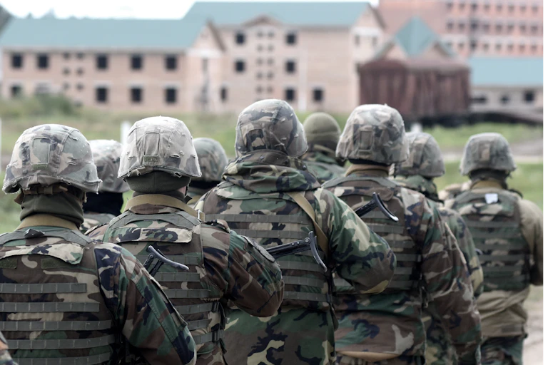 Soldiers wearing military gear