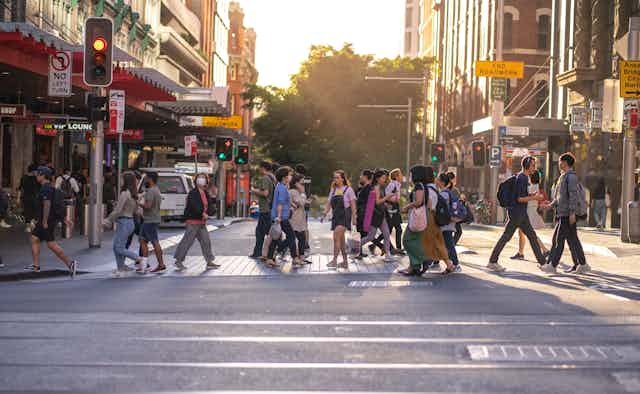 People walk on a Sydney street during the pandemic