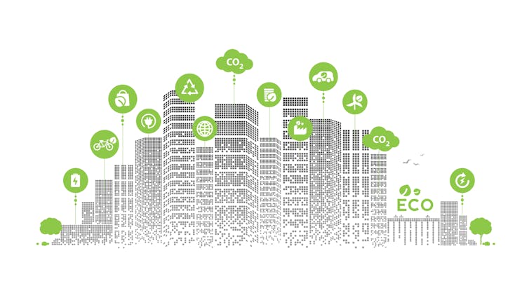 An illustration of buildings with symbols of sustainability above each.