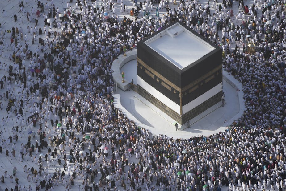 Large numbers of people gathered around the Kabba in Mecca.