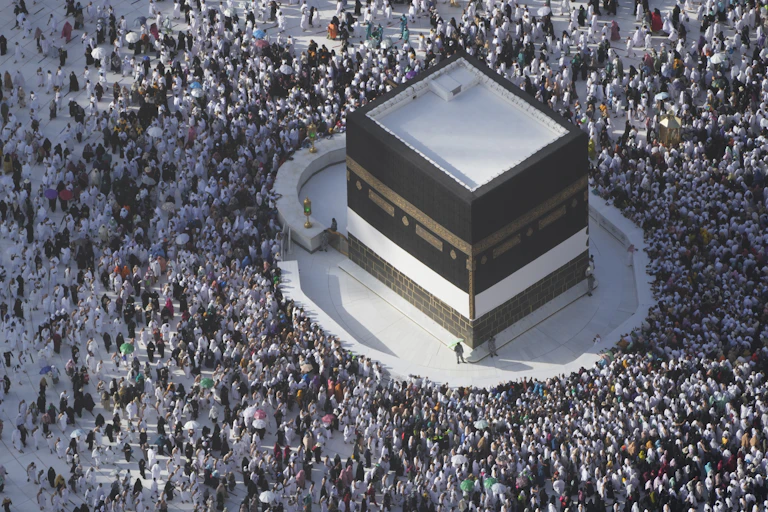 Large numbers of people gathered around the Kabba in Mecca.