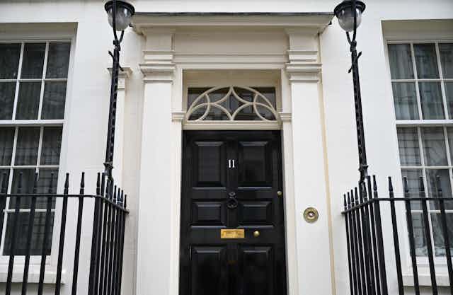 Black front door of 11 Downing Street, London