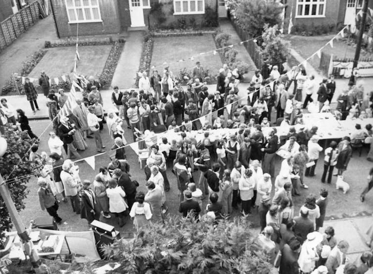 A street party in a suburban area seen from above.