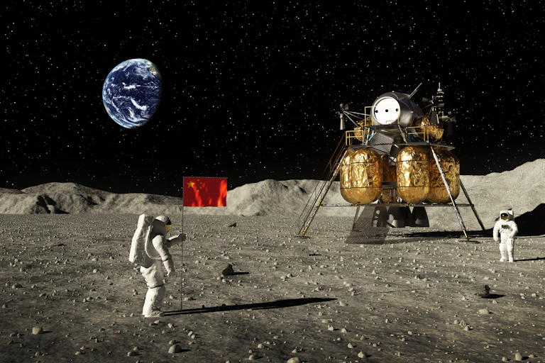A mockup of an astronaut planting a Chinese flag on the Moon.