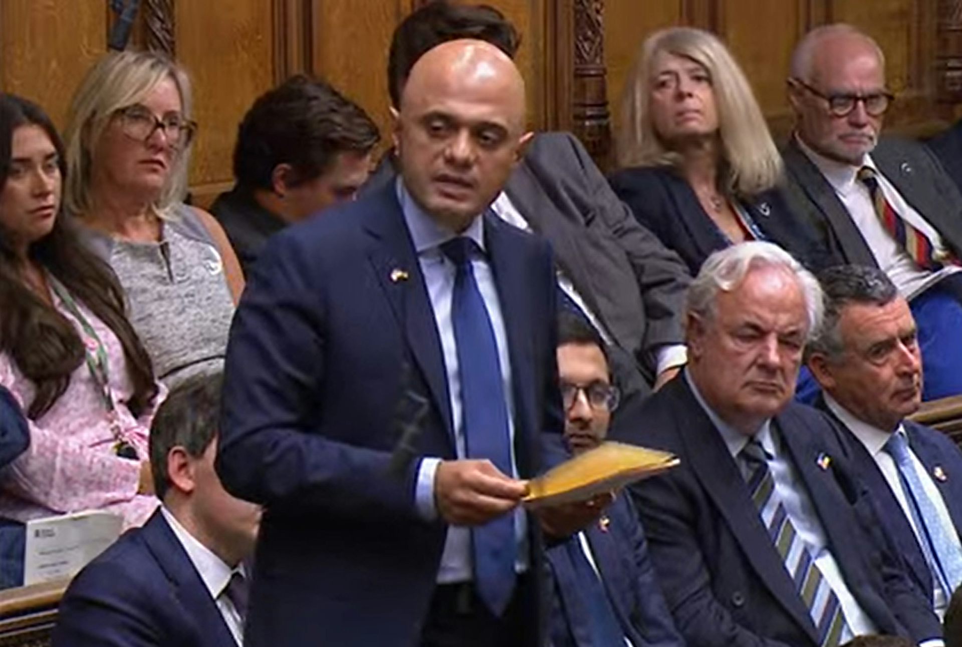 Sajid Javid standing in the House of Commons surrounded by seated MPs, delivering his resignation speech