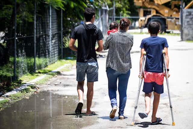 Refugees walking on Nauru