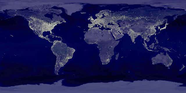 Satellite photo of Earth with city lights illuminated