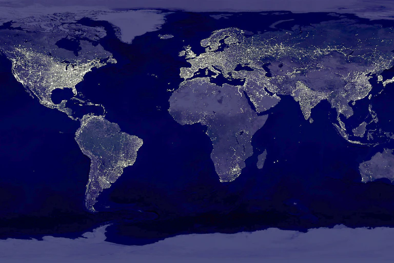 Satellite photo of Earth with city lights illuminated