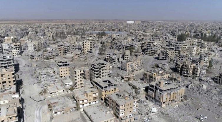 Blocks of bombed out and damaged buildings.