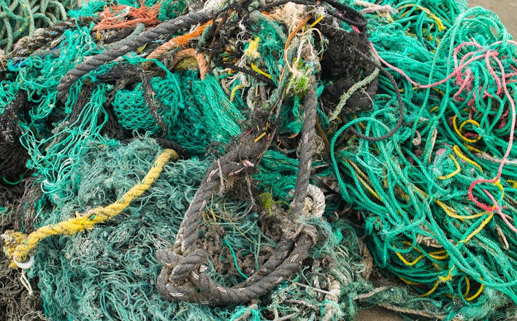 Fishing gear washed up on a beach.