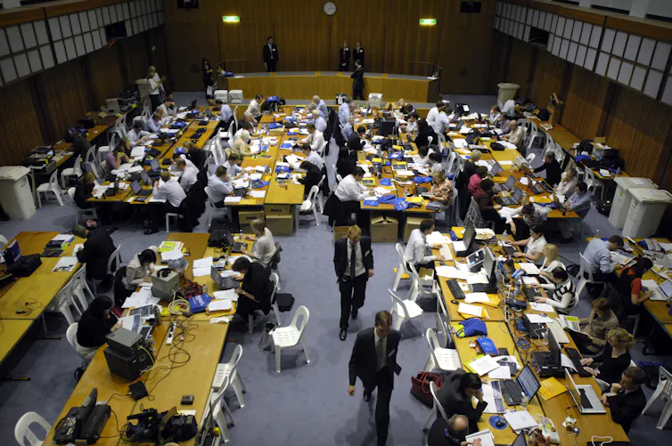 Journalists in the 2008 'budget lockup' review the Rudd government's first budget, overseen by treasurer Wayne Swan's, May 13 2008.
