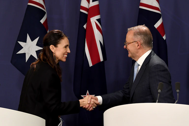 New Zealand Prime Minister Jacinda Ardern shakes hands with Australian Prime Minister Anthony Albanese after speaking to the media during a press conference in Sydney, Friday, July 8 2022.