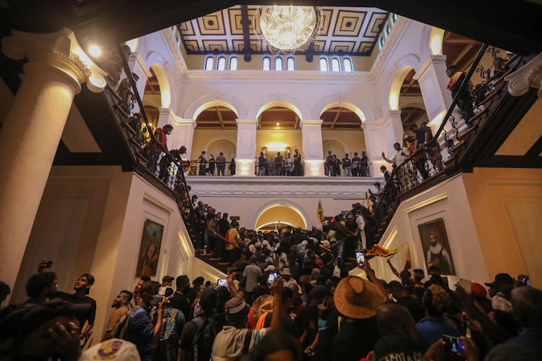 Protesters crowd inside the president's official residence premises in Colombo, Sri Lanka, 09 July 2022.