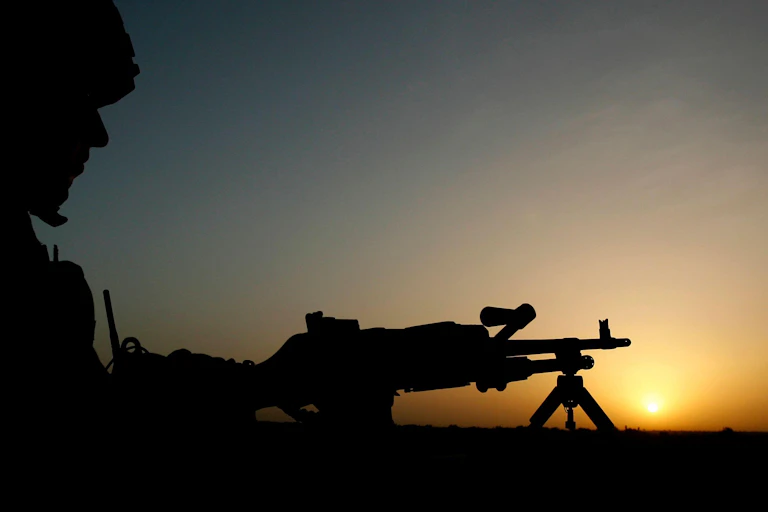 Silhouette of soldier with rifle