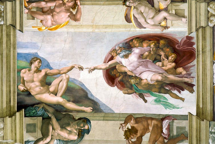 A painting shows God's hand reaching out to touch Adam, the first human in the Bible's story of creation.