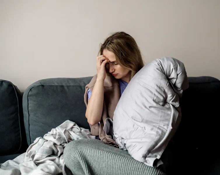 A young woman not feeling well.