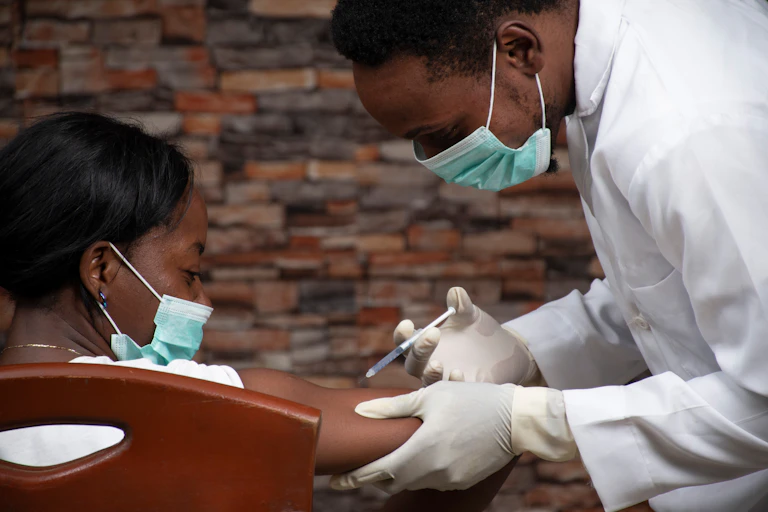Woman being injected with vaccine