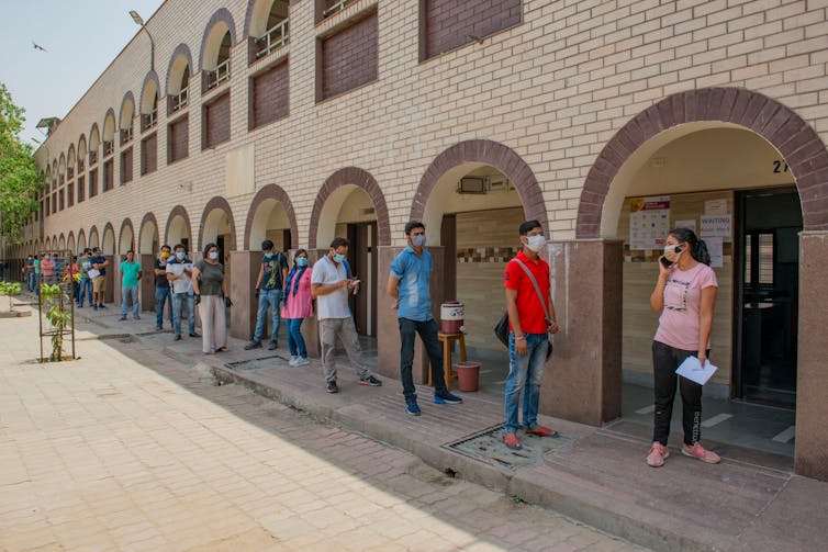 People queueing for vaccine