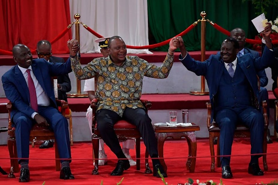 From left to right: Pictures of Kenya's Deputy President William Ruto, President Kenyatta and former Prime Minister Raila Odinga
