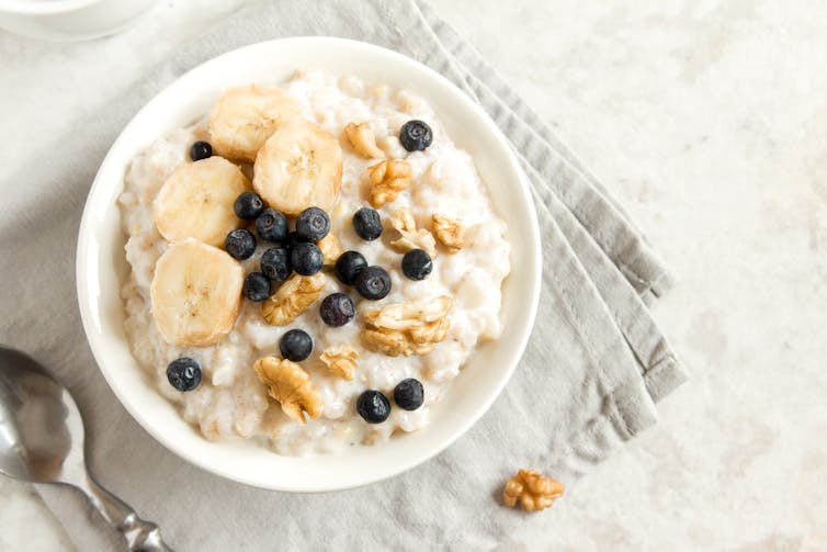 A bowl of porridge with fruit.