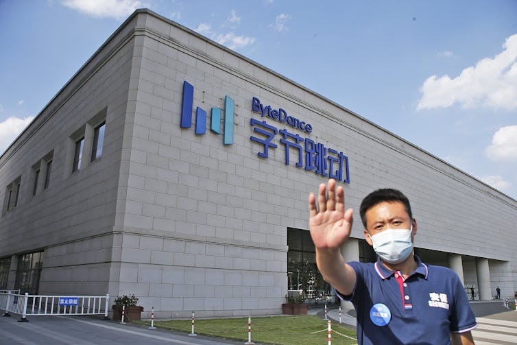 Man in front of ByteDance building