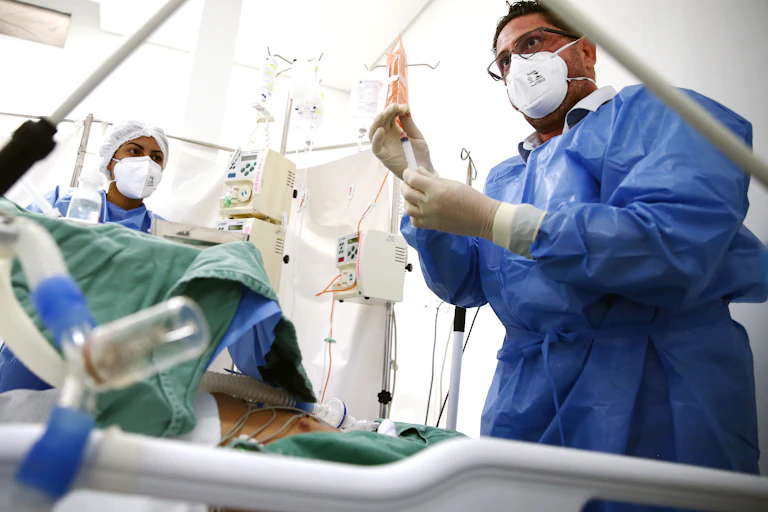 Doctors and nurses with a patient