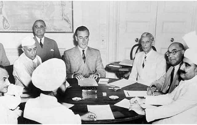 Men sitting around a table
