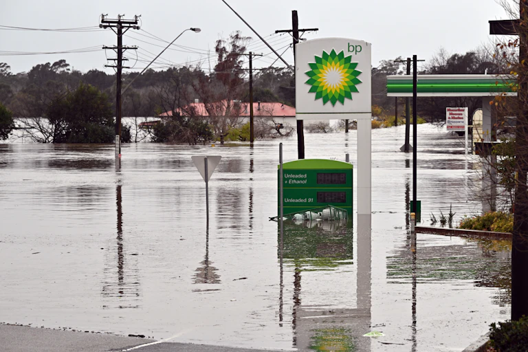 A BP service station under flood waters
