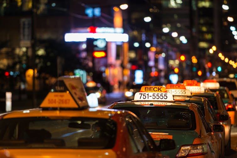 A row of BECK TAXIS