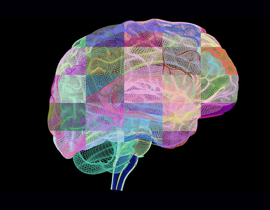Illustration of brain in multicolored tiles against black background