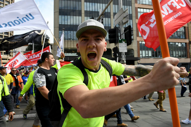 Demonstrators in Sydney, on September 6 2018 demand the abolition of the Australian Building and Construction Commission.