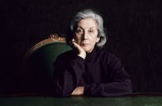 Nadine Gordimer sitting.