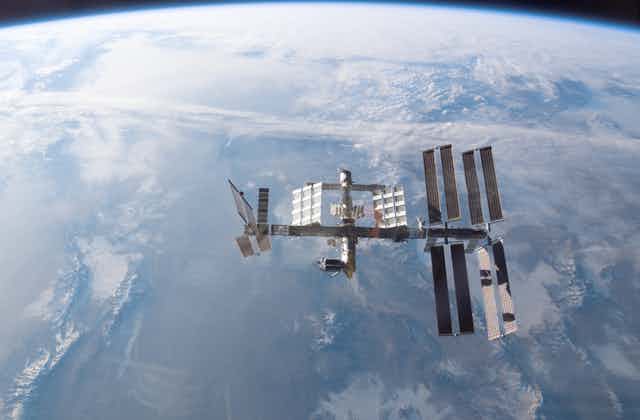 The ISS shown above Earth.
