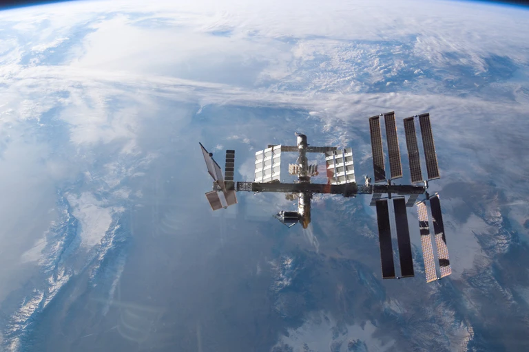 The ISS shown above Earth.