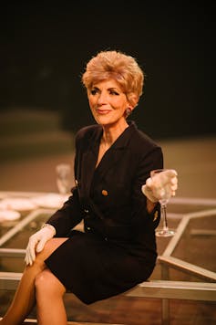 A woman in a pant suit