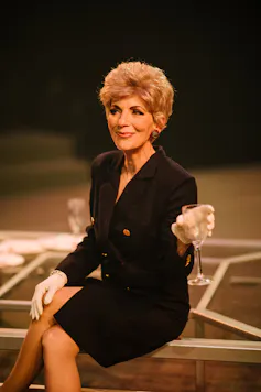 A woman in a pant suit