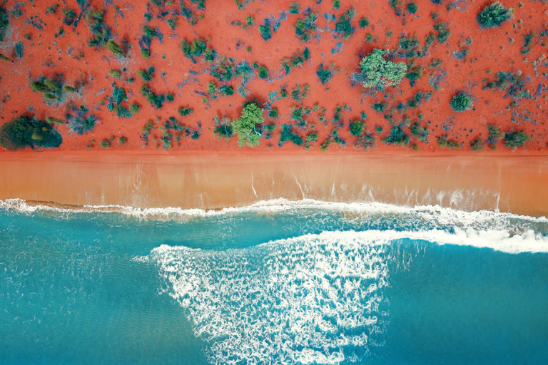 red beach and sea
