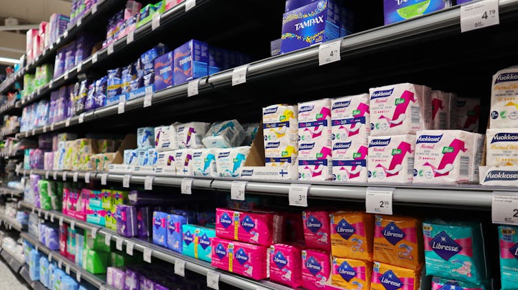 Menstrual products line the supermarket shelves
