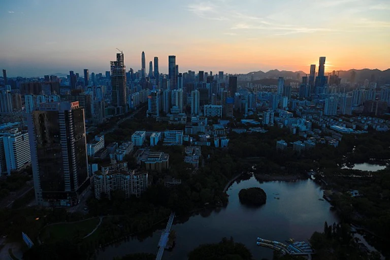 Aerial view of buildings and a body of water