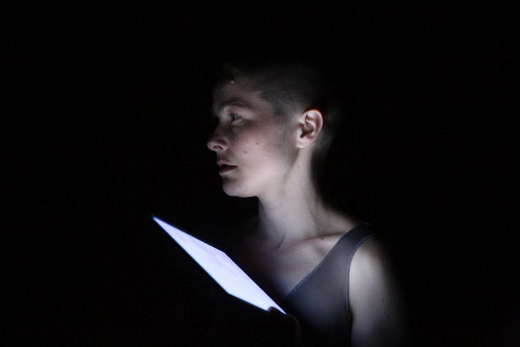 A woman and an iPad.