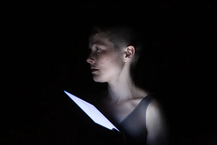 A woman and an iPad.