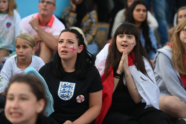 Football fans watch in panic in trafalgar square as england play sweden in the semi-finals of the 2022 euros.